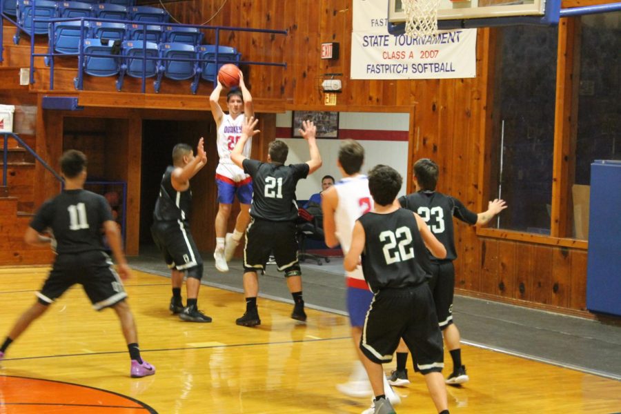 Cutis Cox looks for an open Skylar Cash against OSD on Monday November 26. 