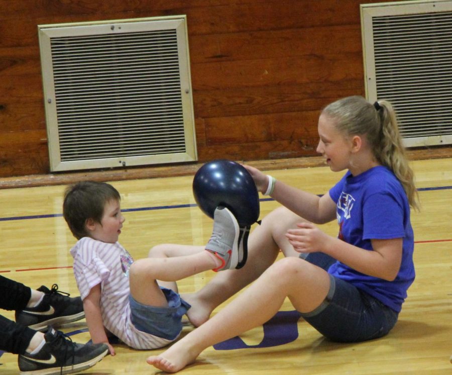 Kaydence Nelson and Hannah Kilbourn take part in a game on Monday, April 8. Nelson was named an honorary Donkey at the assembly. 