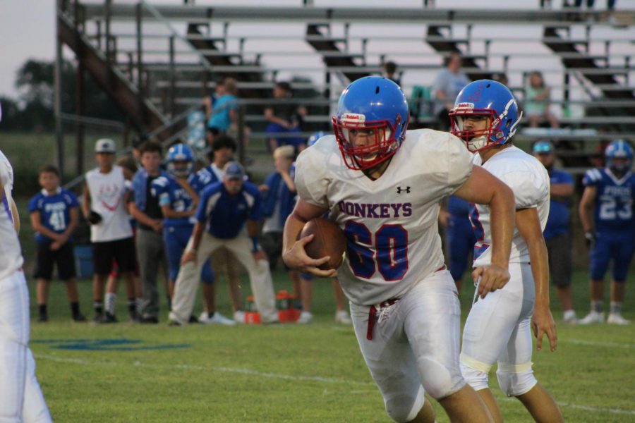 Nathan Turner barrels his way down the field against Paoli. 