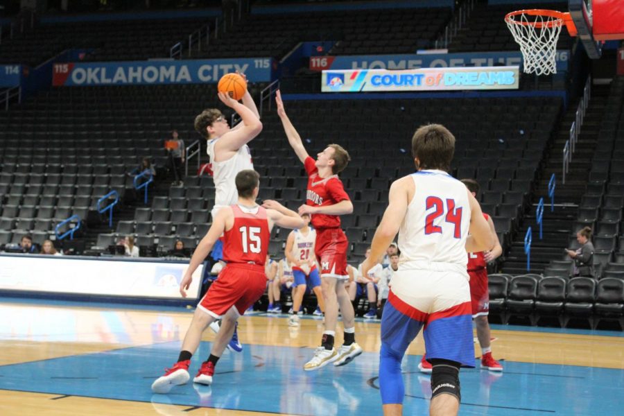 Marshall Loveday shoots the ball against Maysville in Oklahoma City. Loveday was named to the All Conference team this season. 