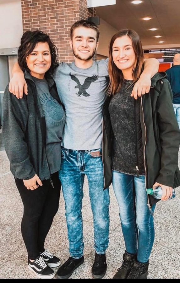 Evan Hines is pictured with his sisters Kaitlyn Evans and Erynn Hines. Evan is this week's Bray-Doyle Senior Spotlight. 