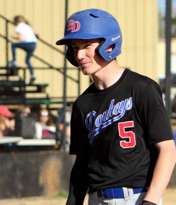 Joe Lumbert flashes his infectious smile during a baseball game his Sophomore year. 